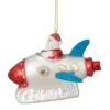 Northlight 4.5" Santa In A Silver Rocket Ship Glass Christmas Ornament 1 Northlight 4.5" Santa In A Silver Rocket Ship Glass Christmas Ornament -Holiday Glow D491148S 1