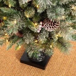 5ft. Pre-Lit Flocked Pine Artificial Christmas Tree In Black Urn, Warm White Lights 17 5ft. Pre-Lit Flocked Pine Artificial Christmas Tree In Black Urn, Warm White Lights -Holiday Glow D494335S 6